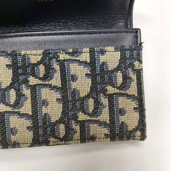 Authenticated pre-owned  Saddle Oblique Canvas Blue Card Holder - Card Holder at Looply