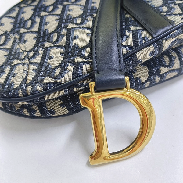 Authenticated pre-owned  Saddle Mini Oblique Canvas Blue - Top Handle Bag at Looply