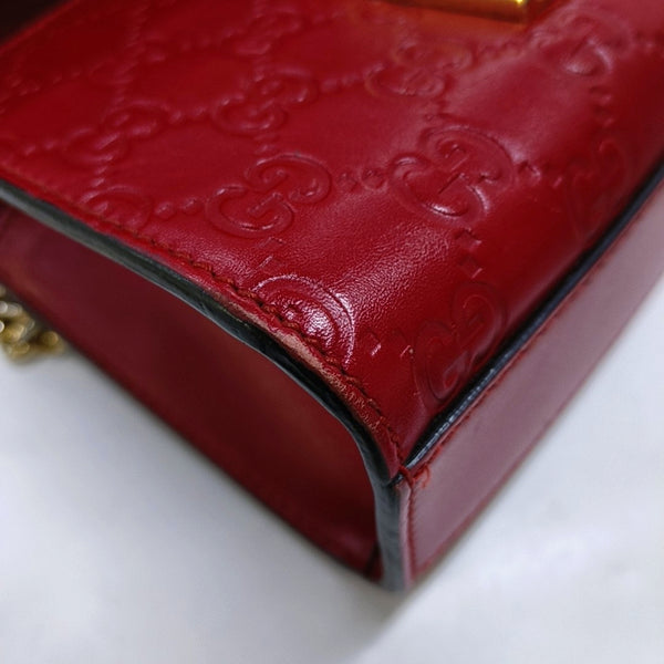 Authenticated pre-owned  Padlock Small Monogram Calfskin Red - Crossbody Bag at Looply