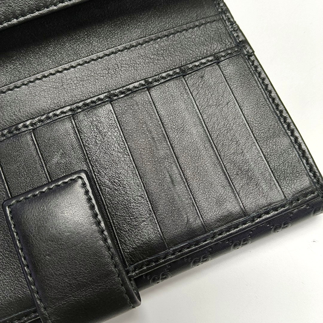 Authenticated pre-owned  Microguccissima Monogram Calfskin Black Wallet - Wallet at Looply