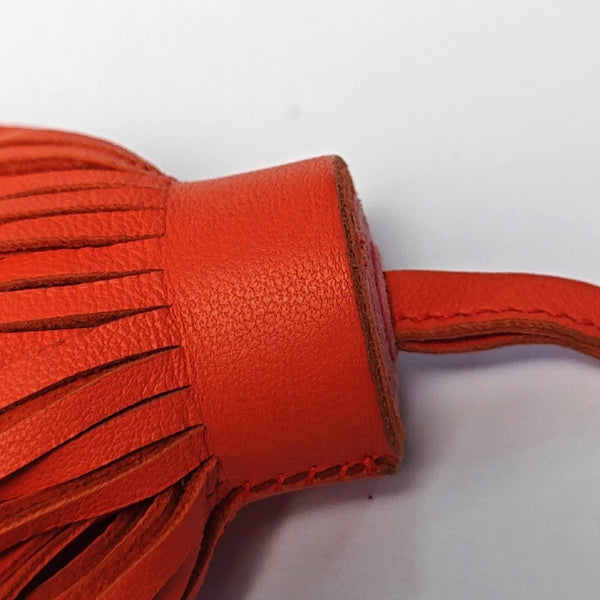 Authenticated pre-owned  Leather Orange Bag Charm - Bag Charm at Looply