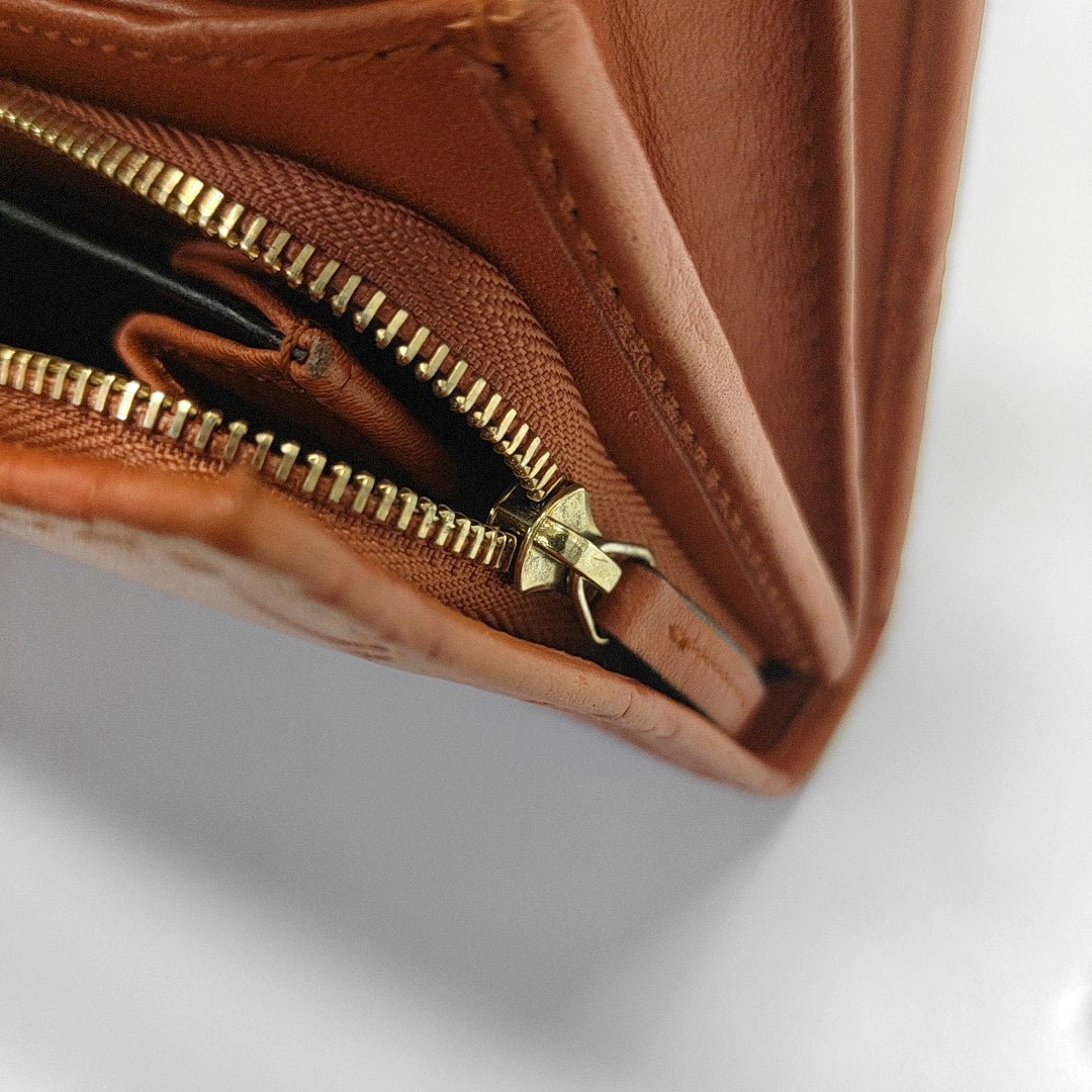 Authenticated pre-owned  Microguccissima Monogram Calfskin Brown - Top Handle Bag at Looply