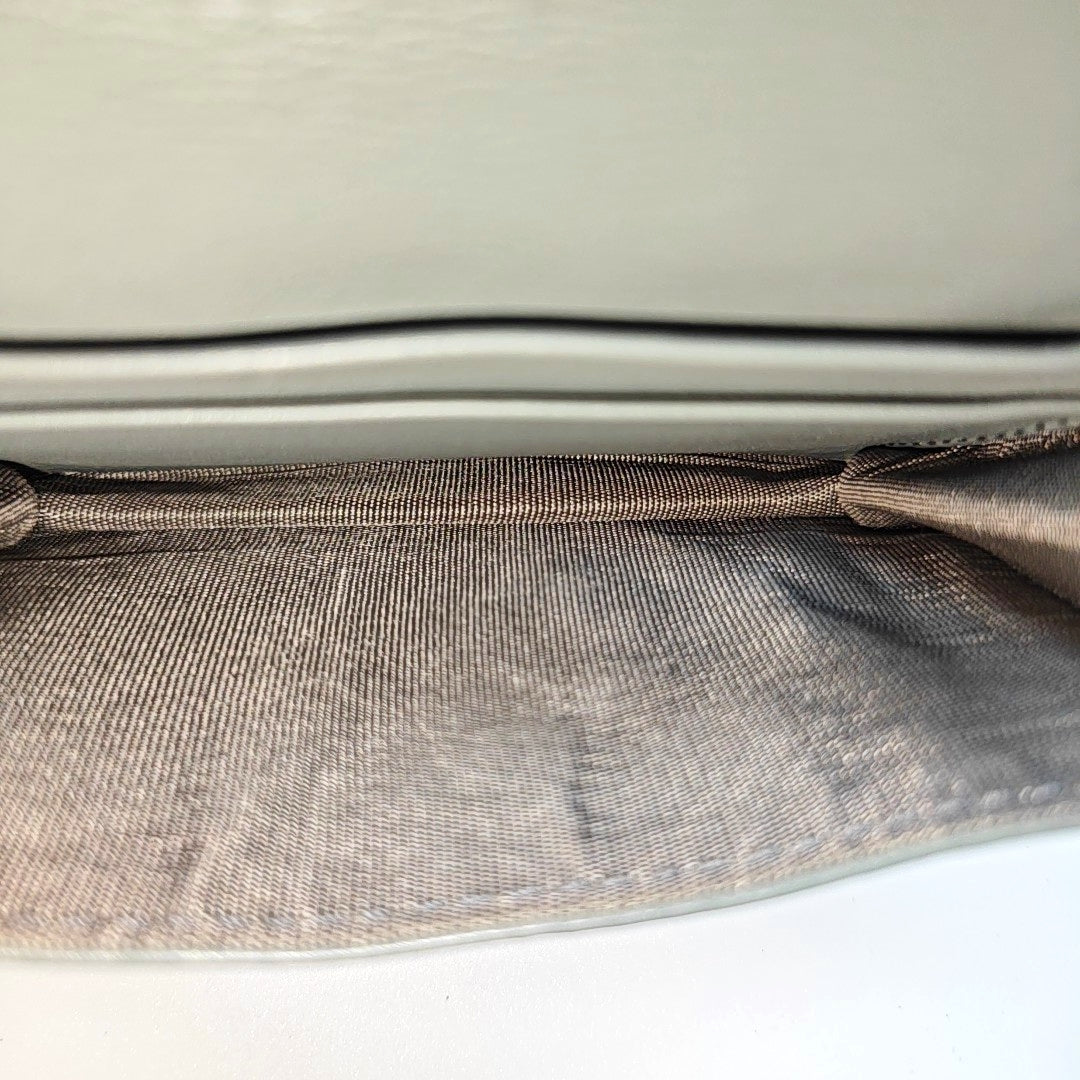 Authenticated pre-owned  Saddle Oblique Canvas Gray Card Holder - Card Holder at Looply