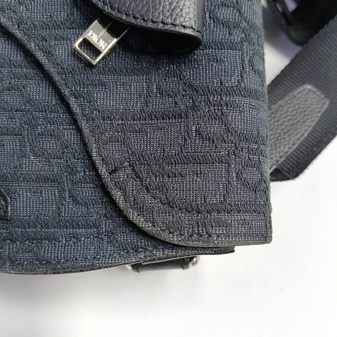 Authenticated pre-owned  Saddle Oblique Canvas Black - Shoulder Bag at Looply