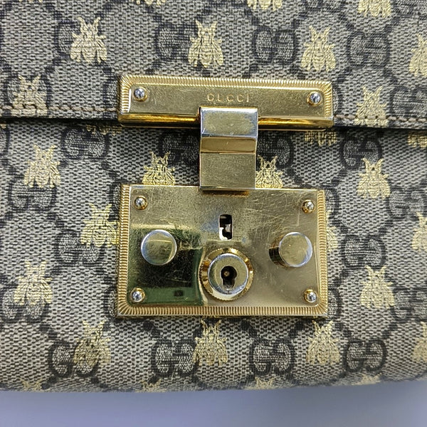 Authenticated pre-owned  Padlock Small Monogram Coated Canvas Beige - Shoulder Bag at Looply
