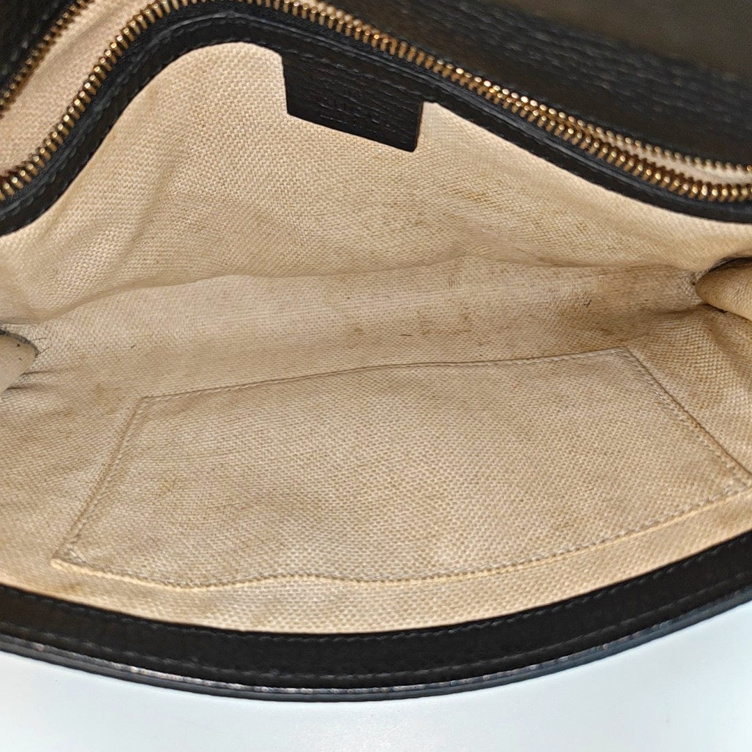 Authenticated pre-owned  Soho Calfskin Black - Clutch at Looply