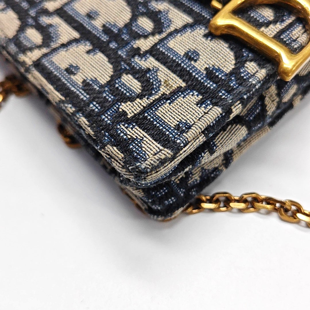 Authenticated pre-owned  Saddle Monogram Canvas Blue - Shoulder Bag at Looply