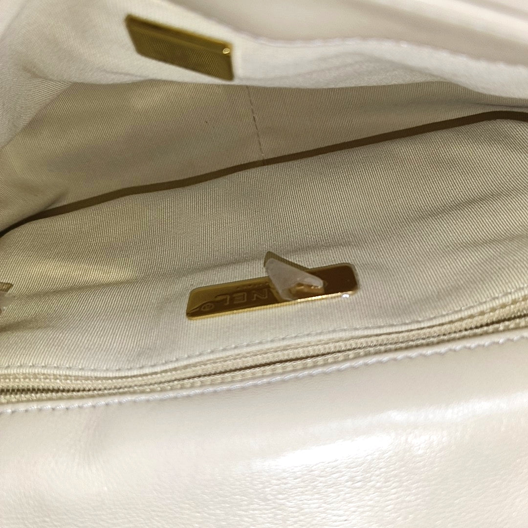 Authenticated pre-owned  Chanel 19 Quilted Lambskin Beige - Shoulder Bag at Looply