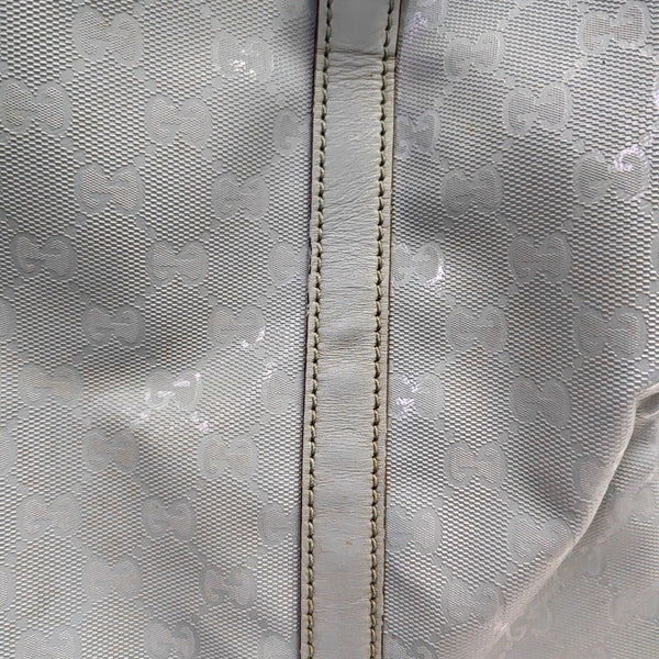 Authenticated pre-owned  Joy Medium Monogram Coated Canvas Blue - Top Handle Bag at Looply