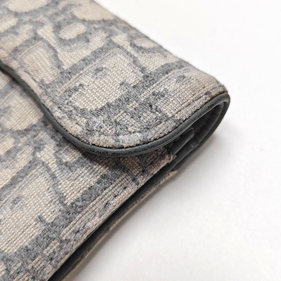 Authenticated pre-owned  Saddle Oblique Canvas Gray Card Holder - Card Holder at Looply