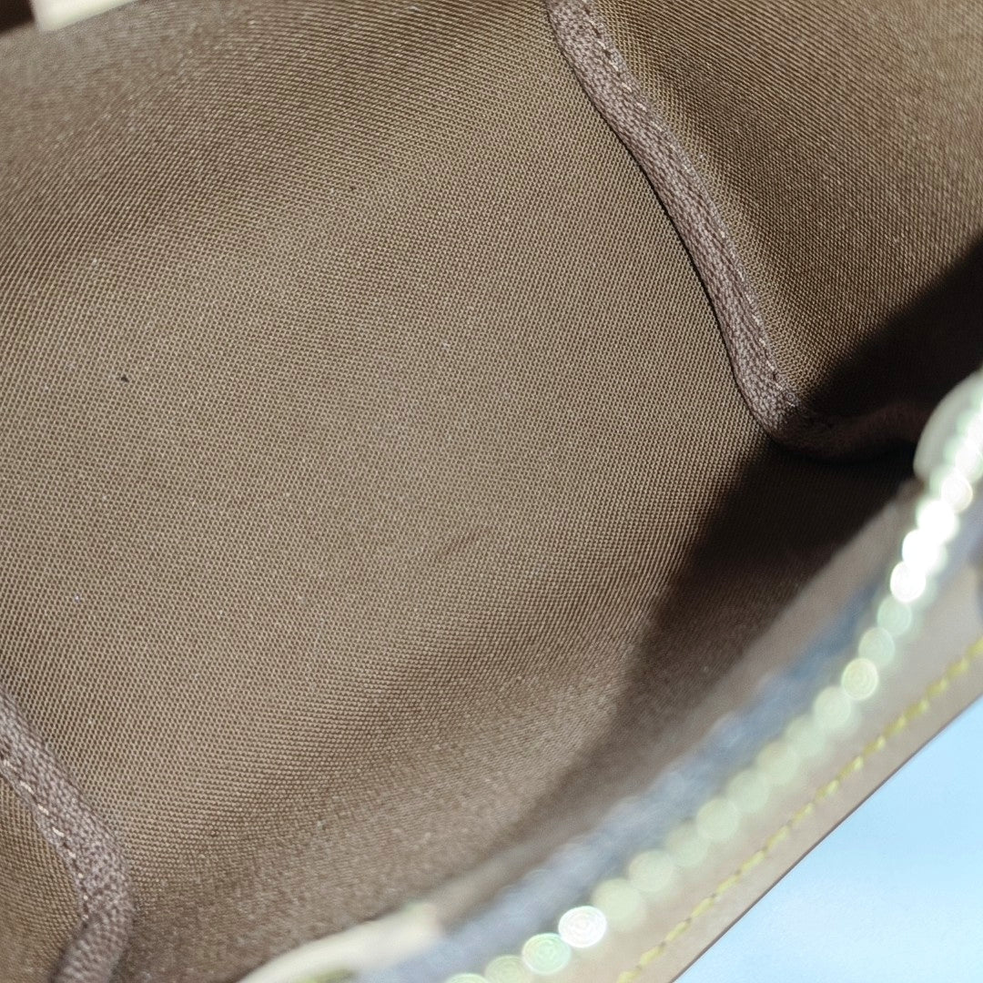 Authenticated pre-owned  Speedy Nano Monogram Coated Canvas Brown - Shoulder Bag at Looply