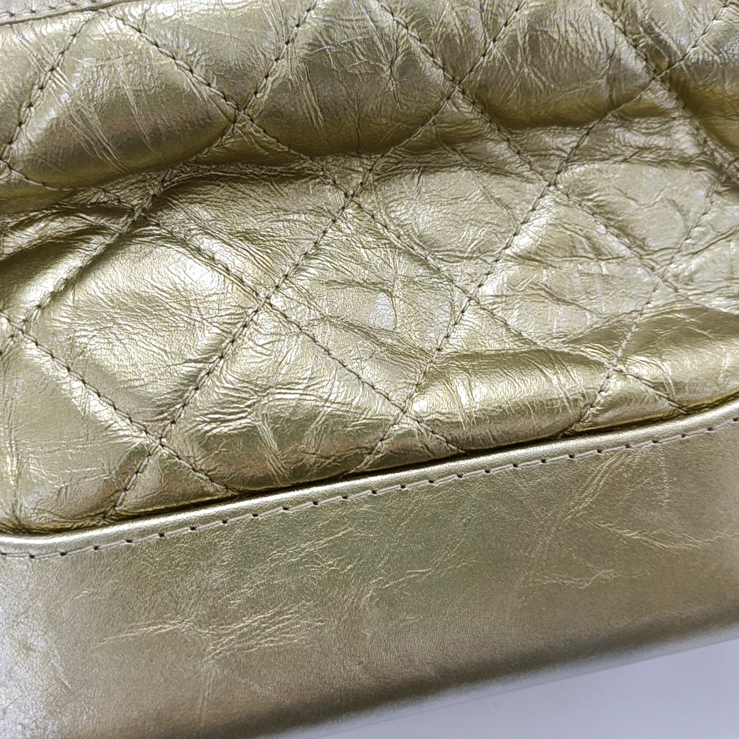 Authenticated pre-owned  Gabrielle Small Quilted Calfskin Gold - Crossbody Bag at Looply