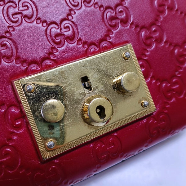 Authenticated pre-owned  Padlock Small Monogram Calfskin Red - Crossbody Bag at Looply