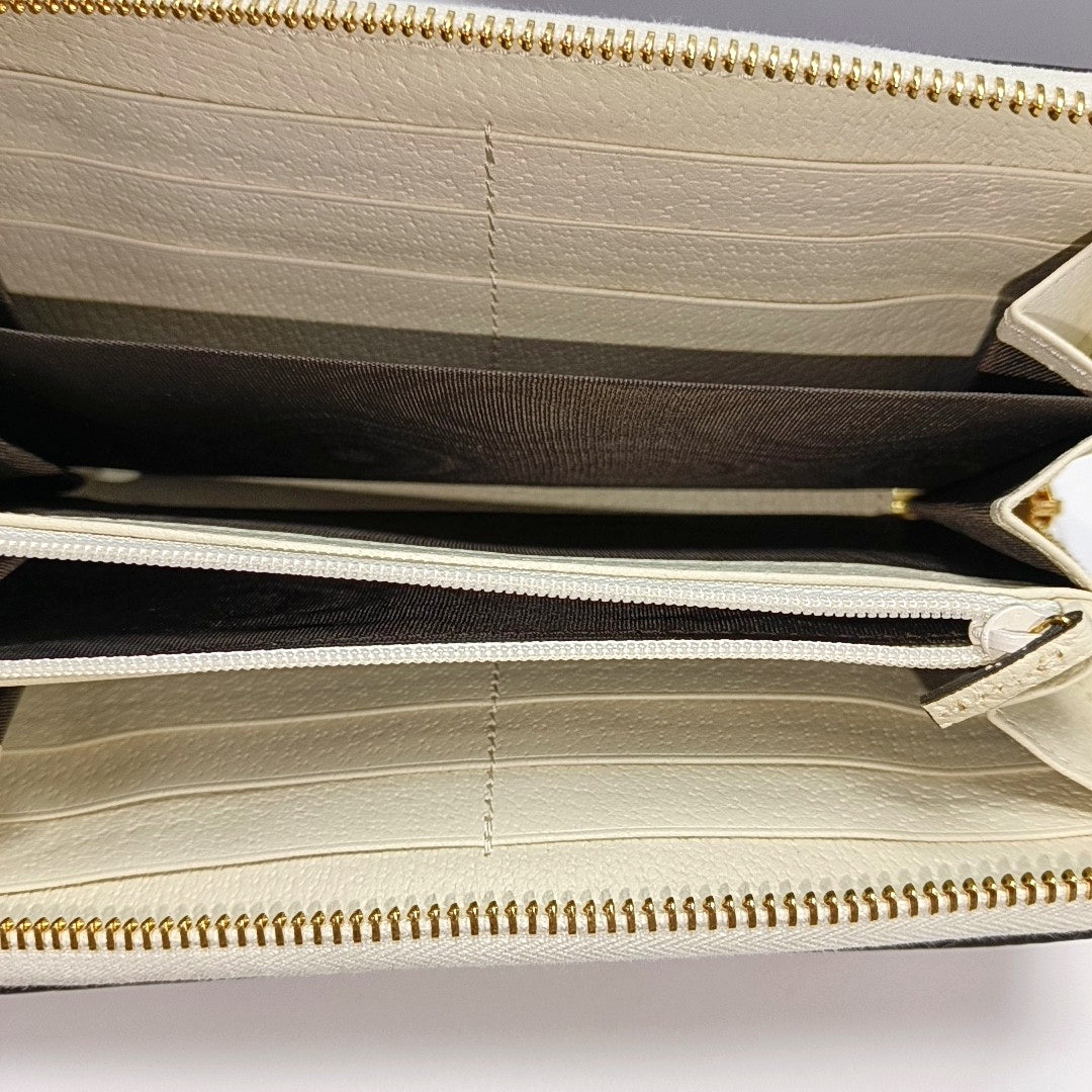 Authenticated pre-owned  Ophidia Monogram Coated Canvas Beige Wallet - Wallet at Looply