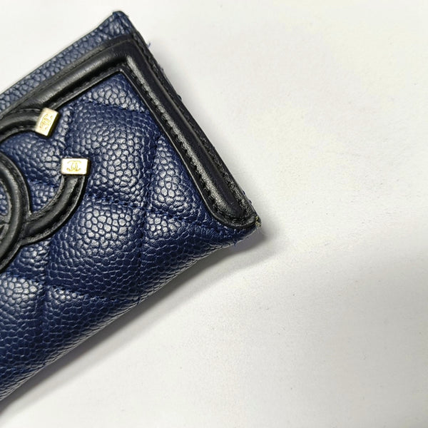 Authenticated pre-owned  Filigree Quilted Grained Calfskin Blue Card Holder - Card Holder at Looply