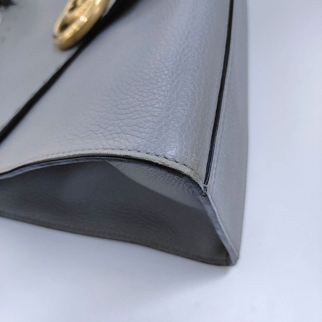 Authenticated pre-owned  GG Marmont Top Handle Calfskin Gray - Crossbody Bag at Looply