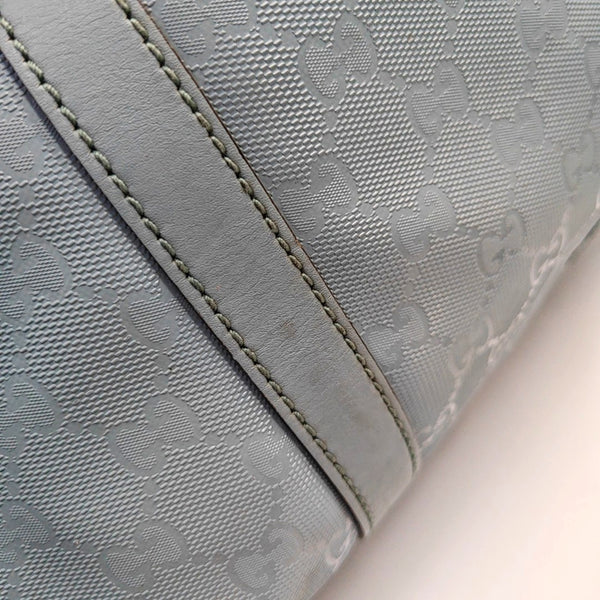 Authenticated pre-owned  Joy Medium Monogram Coated Canvas Blue - Top Handle Bag at Looply