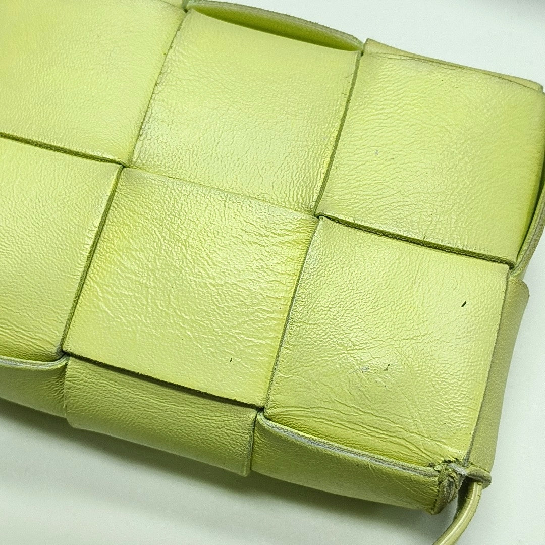 Authenticated pre-owned  Cassette Small Lambskin Yellow - Crossbody Bag at Looply