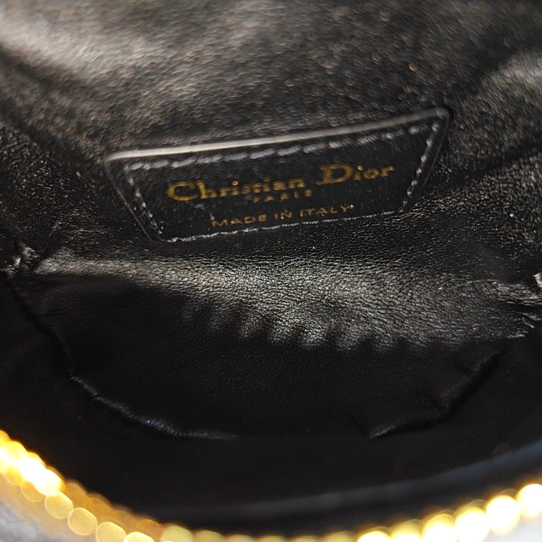 Authenticated pre-owned  Dior Caro Calfskin Black - Clutch at Looply