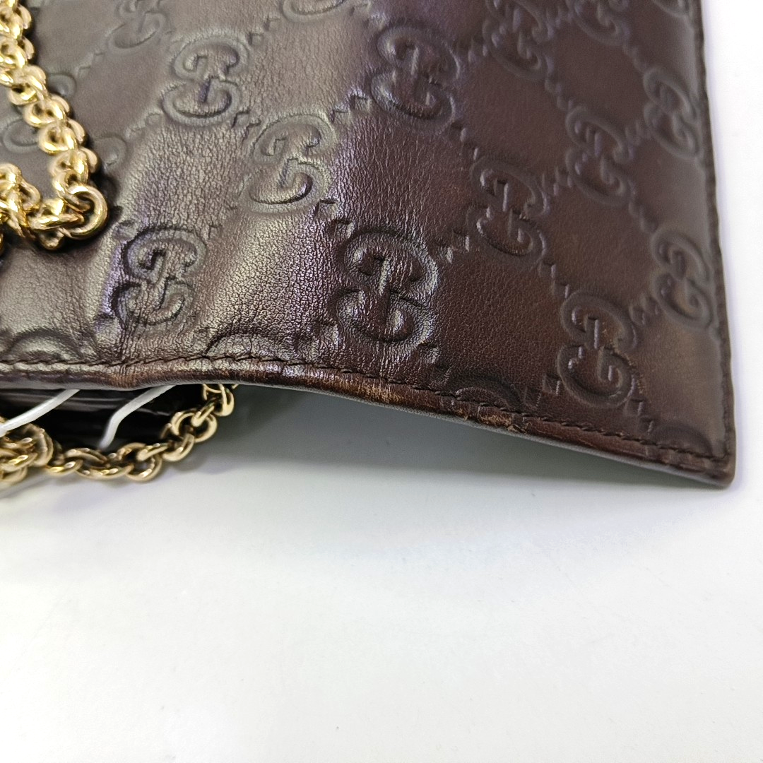 Authenticated pre-owned  Microguccissima Monogram Calfskin Brown - Top Handle Bag at Looply