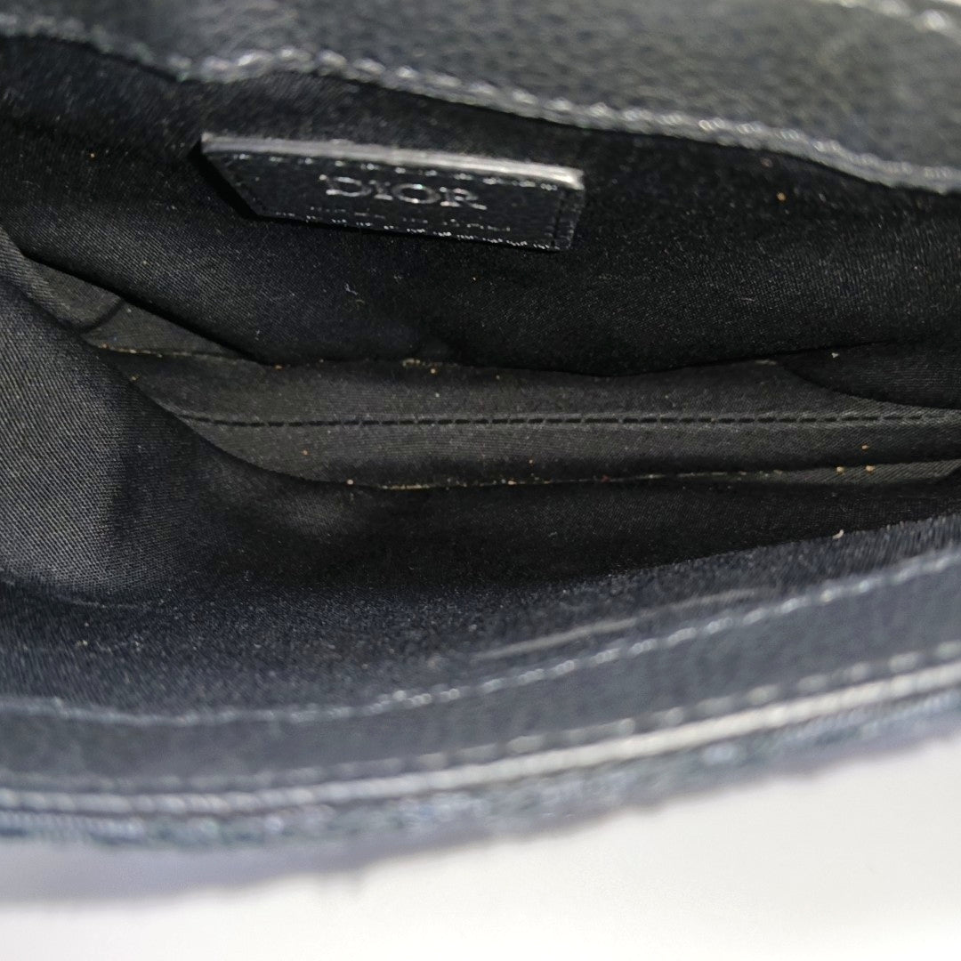 Authenticated pre-owned  Saddle Oblique Canvas Black - Shoulder Bag at Looply