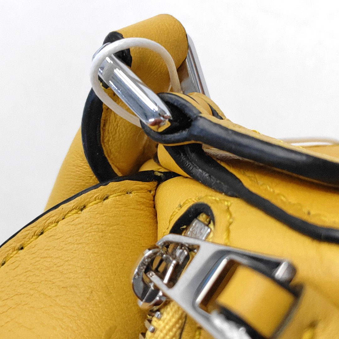 Authenticated pre-owned  Puzzle Calfskin Yellow - Crossbody Bag at Looply