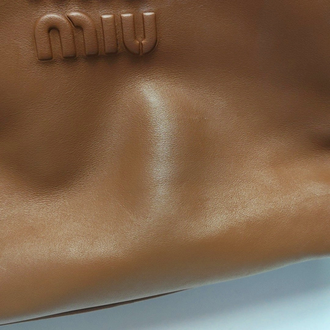 Authenticated pre-owned  Beau Large Calfskin Brown - Top Handle Bag at Looply