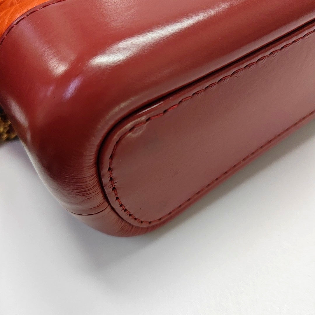Authenticated pre-owned  Gabrielle Small Chevron Calfskin Orange - Shoulder Bag at Looply