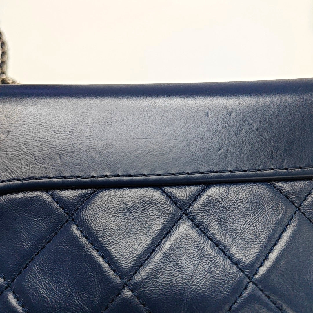 Authenticated pre-owned  Gabrielle Small Quilted Calfskin Blue - Clutch at Looply