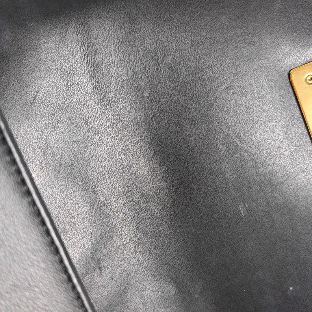 Authenticated pre-owned  Boy Chanel Small Chevron Calfskin Black - Shoulder Bag at Looply