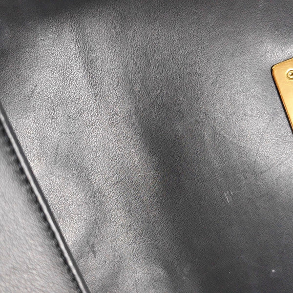 Authenticated pre-owned  Boy Chanel Small Chevron Calfskin Black - Shoulder Bag at Looply