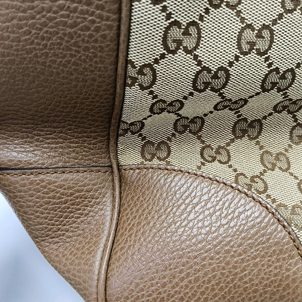 Authenticated pre-owned  Bree Small Monogram Canvas Beige - Top Handle Bag at Looply