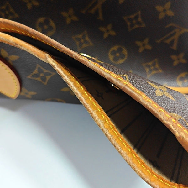 Authenticated pre-owned  Neverfull GM Monogram Coated Canvas Brown - Shoulder Bag at Looply