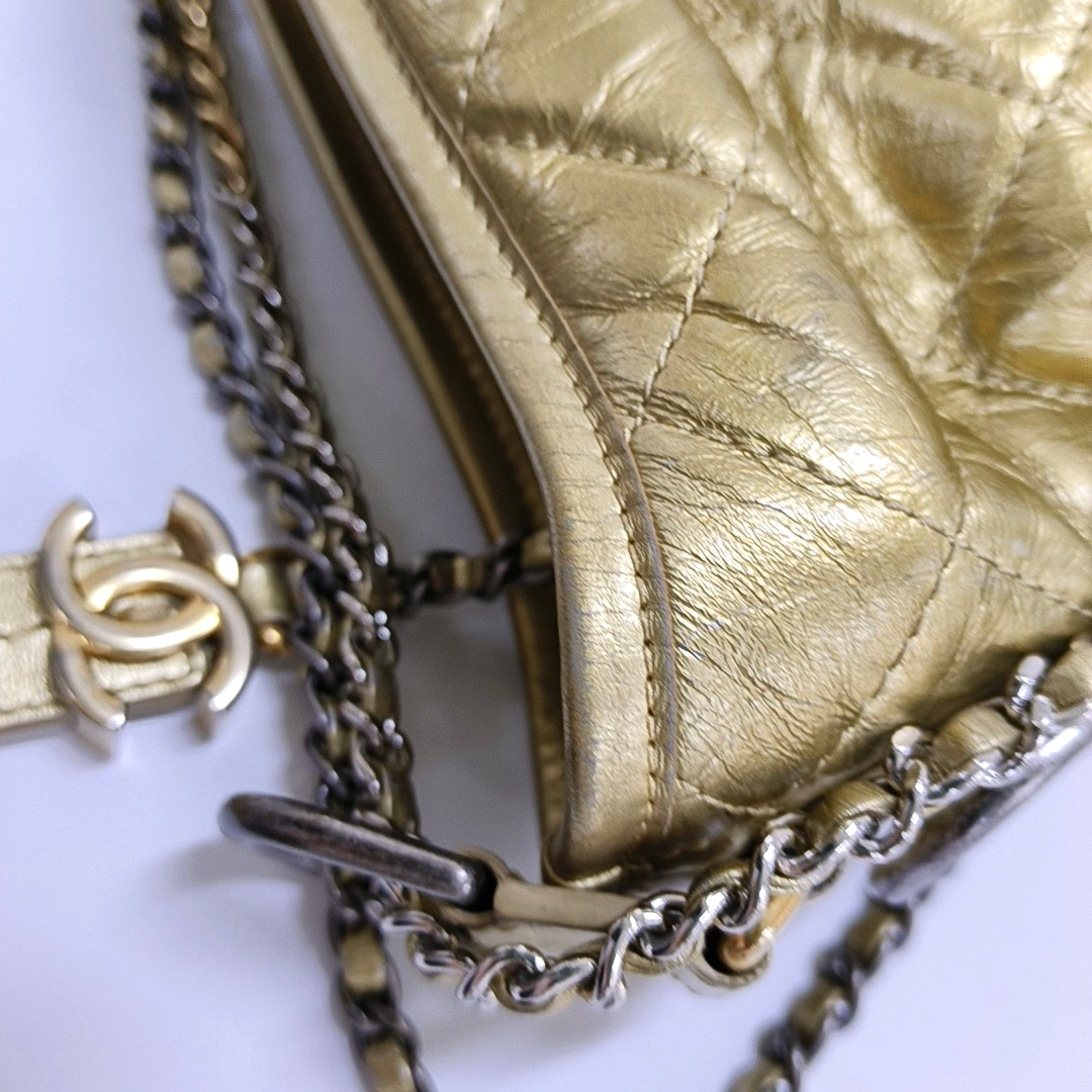Authenticated pre-owned  Gabrielle Small Quilted Calfskin Gold - Crossbody Bag at Looply