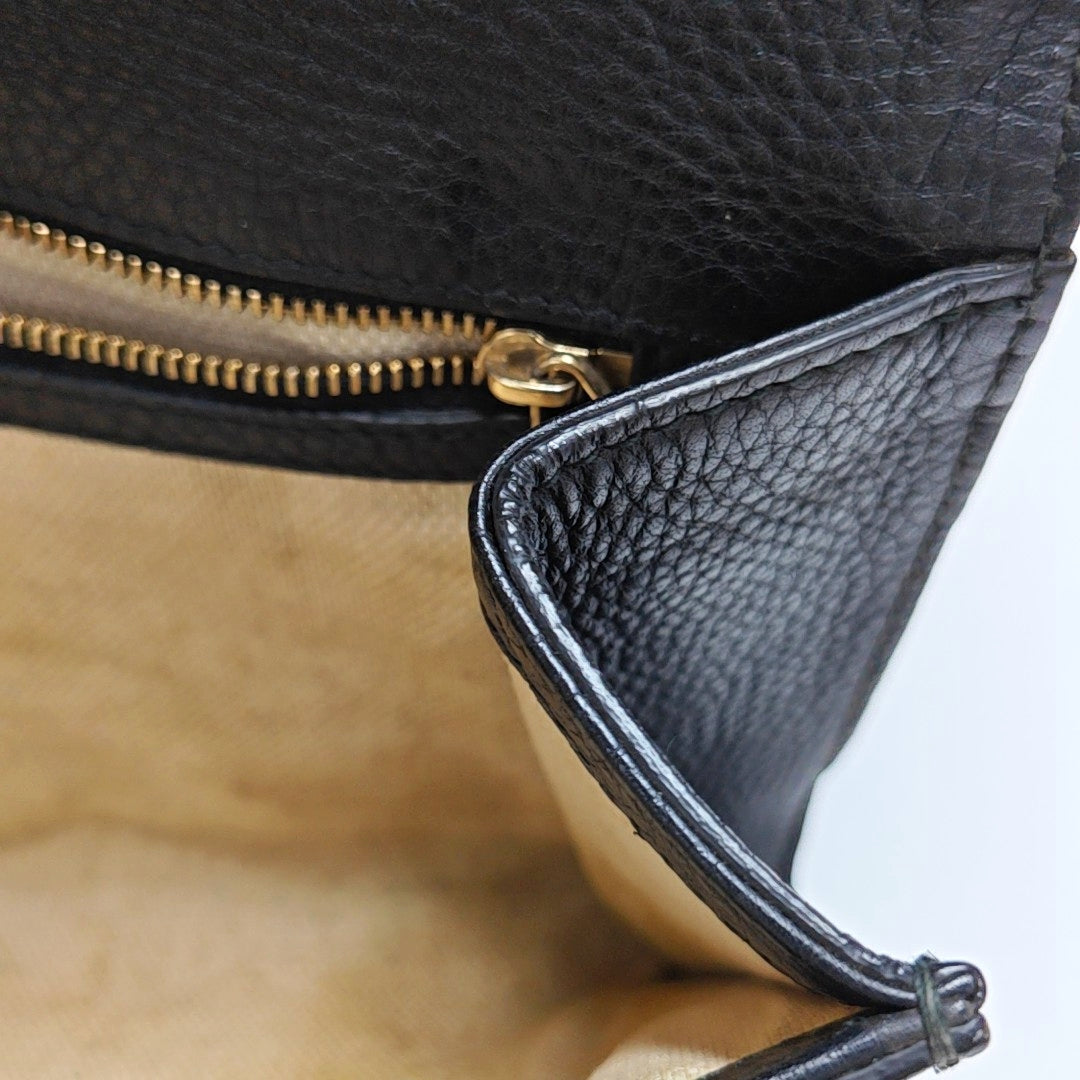 Authenticated pre-owned  Soho Calfskin Black - Clutch at Looply