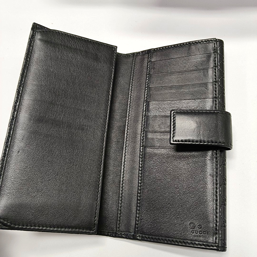 Authenticated pre-owned  Microguccissima Monogram Calfskin Black Wallet - Wallet at Looply