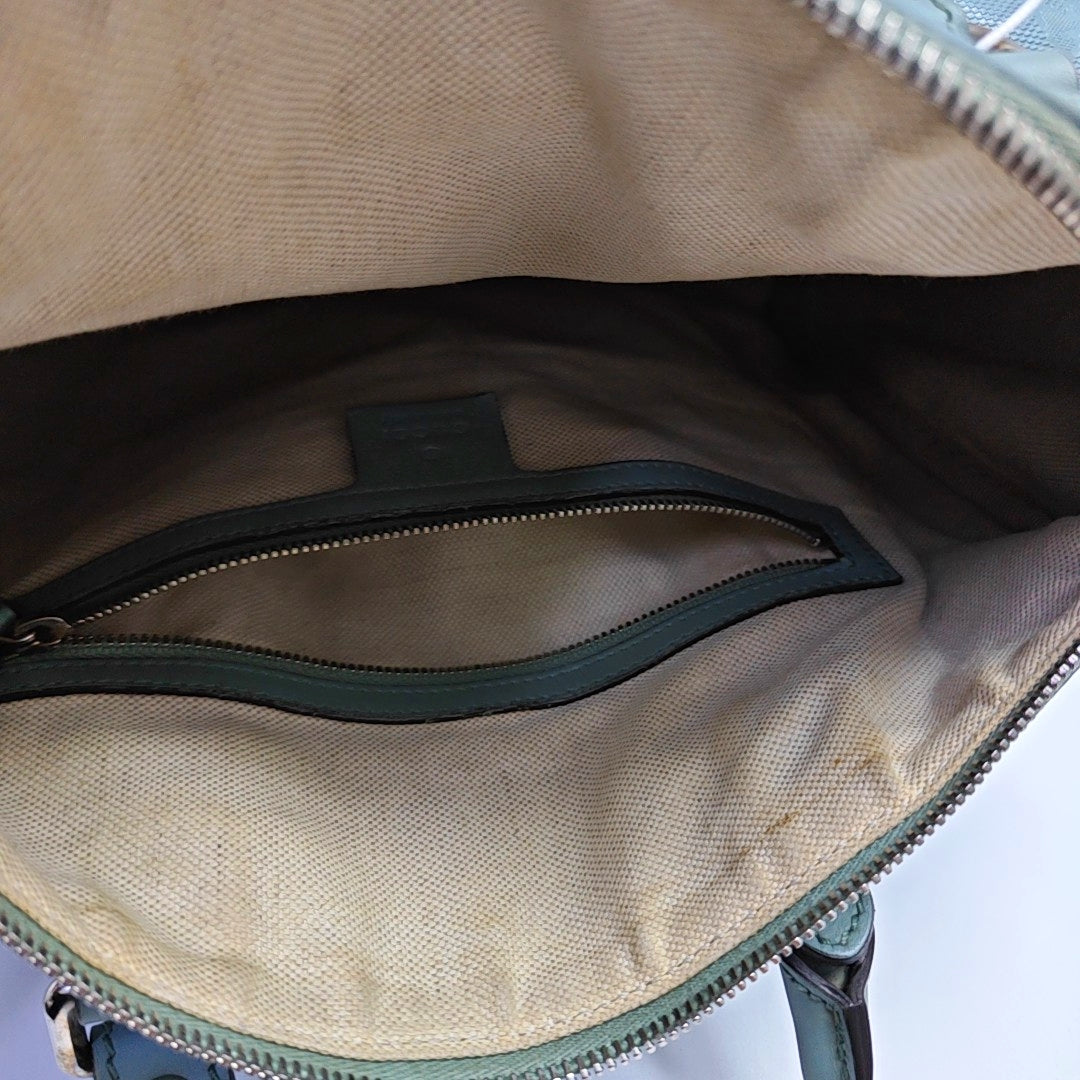 Authenticated pre-owned  Joy Medium Monogram Coated Canvas Blue - Top Handle Bag at Looply