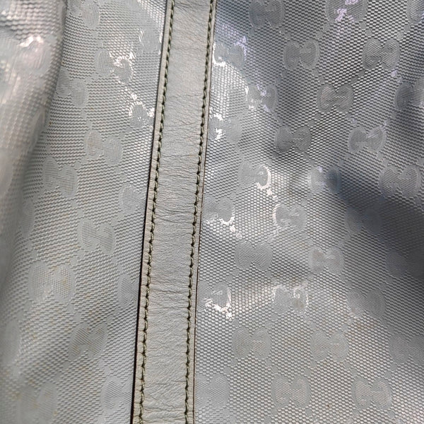Authenticated pre-owned  Joy Medium Monogram Coated Canvas Blue - Top Handle Bag at Looply