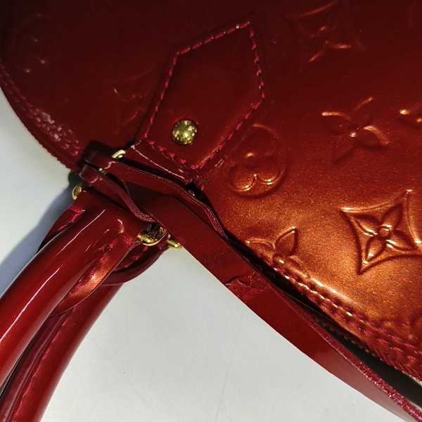 Authenticated pre-owned  Alma GM Patent Leather Red - Top Handle Bag at Looply