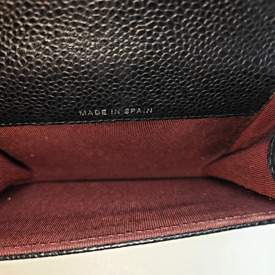 Authenticated pre-owned  Classic Flap Quilted Grained Calfskin Black Card Holder - Card Holder at Looply