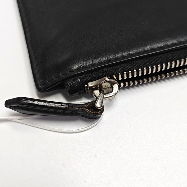 Authenticated pre-owned  Monster Calfskin Black - Clutch at Looply