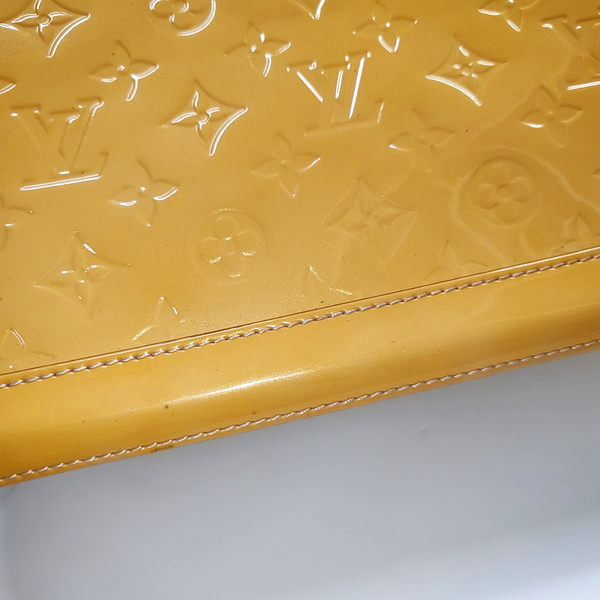 Authenticated pre-owned  Alma PM Patent Leather Yellow - Top Handle Bag at Looply