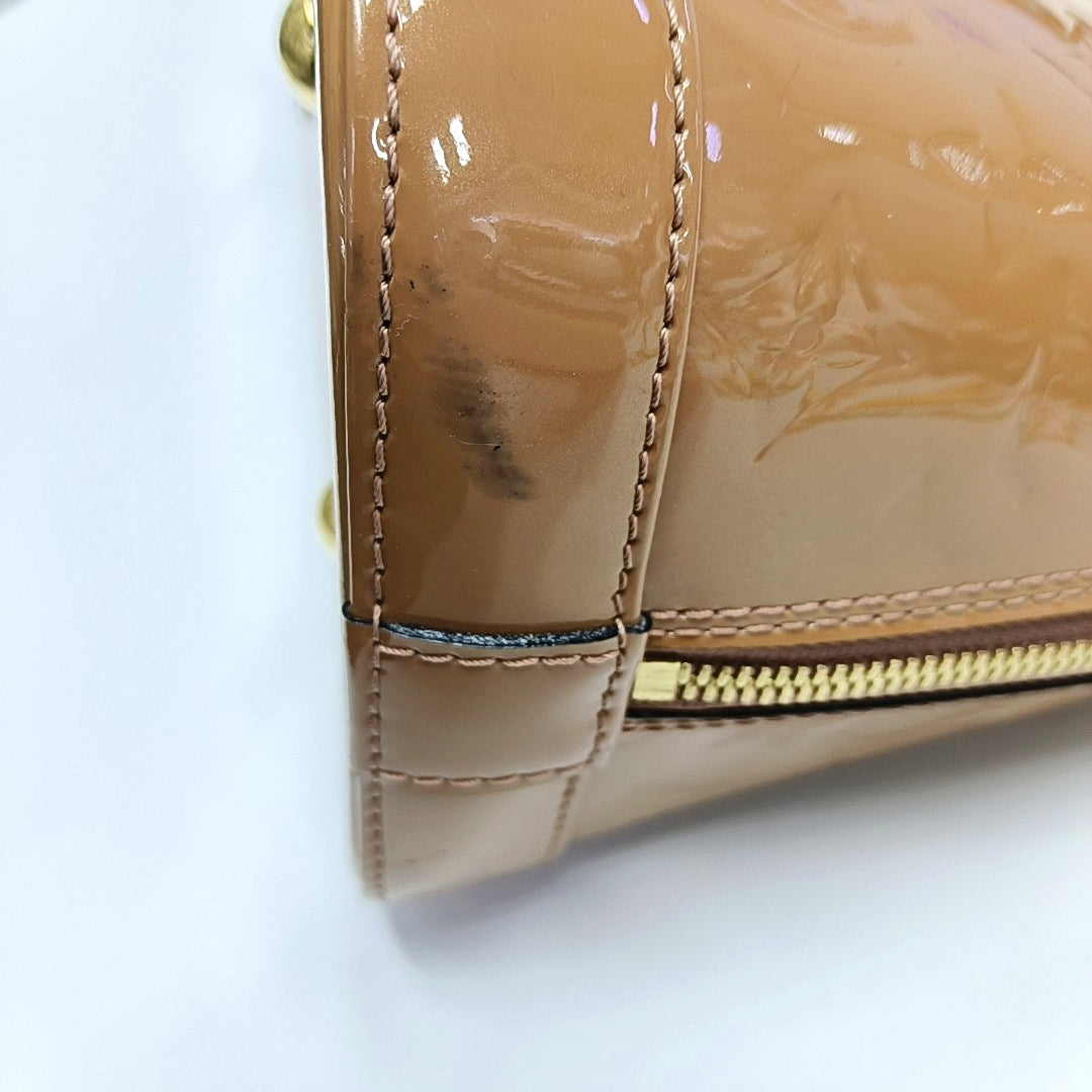 Authenticated pre-owned  Alma PM Patent Leather Beige - Top Handle Bag at Looply