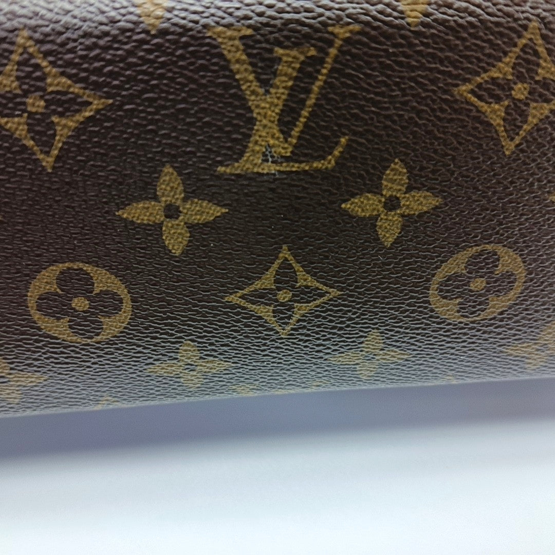 Authenticated pre-owned  Pallas Monogram Coated Canvas Brown - Clutch at Looply