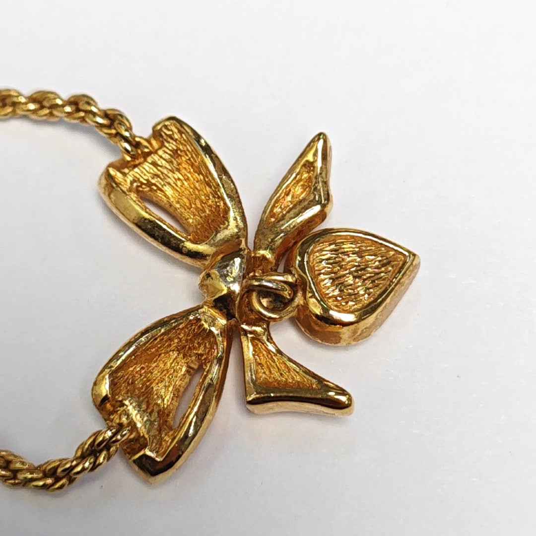 Authenticated pre-owned  Bow Gold Tone Metal Gold Necklace - Necklace at Looply