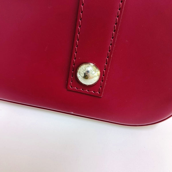 Authenticated pre-owned  Alma PM Epi Burgundy - Top Handle Bag at Looply