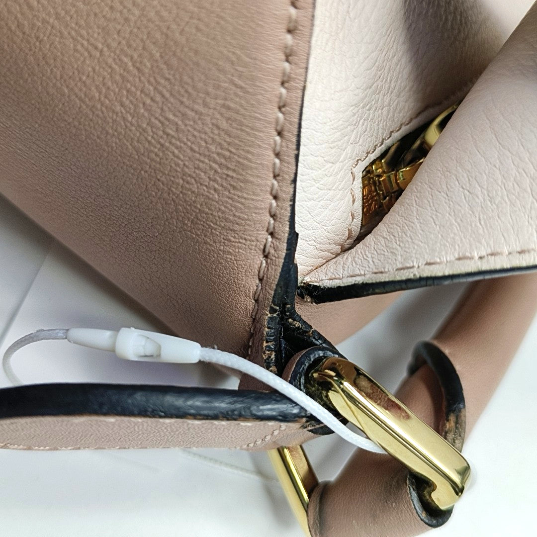 Authenticated pre-owned  Puzzle Small Calfskin Beige - Shoulder Bag at Looply