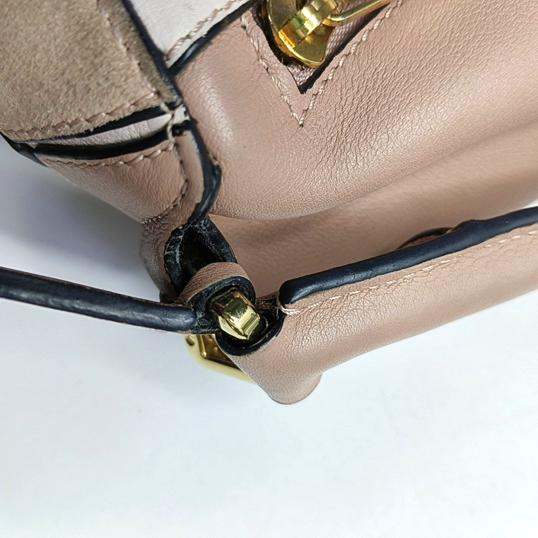 Authenticated pre-owned  Puzzle Small Calfskin Beige - Shoulder Bag at Looply