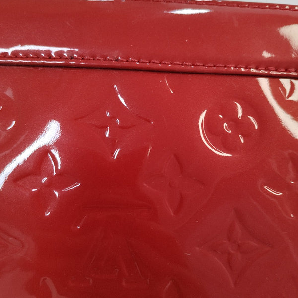 Authenticated pre-owned  Alma PM Monogram Patent Leather Red - Top Handle Bag at Looply