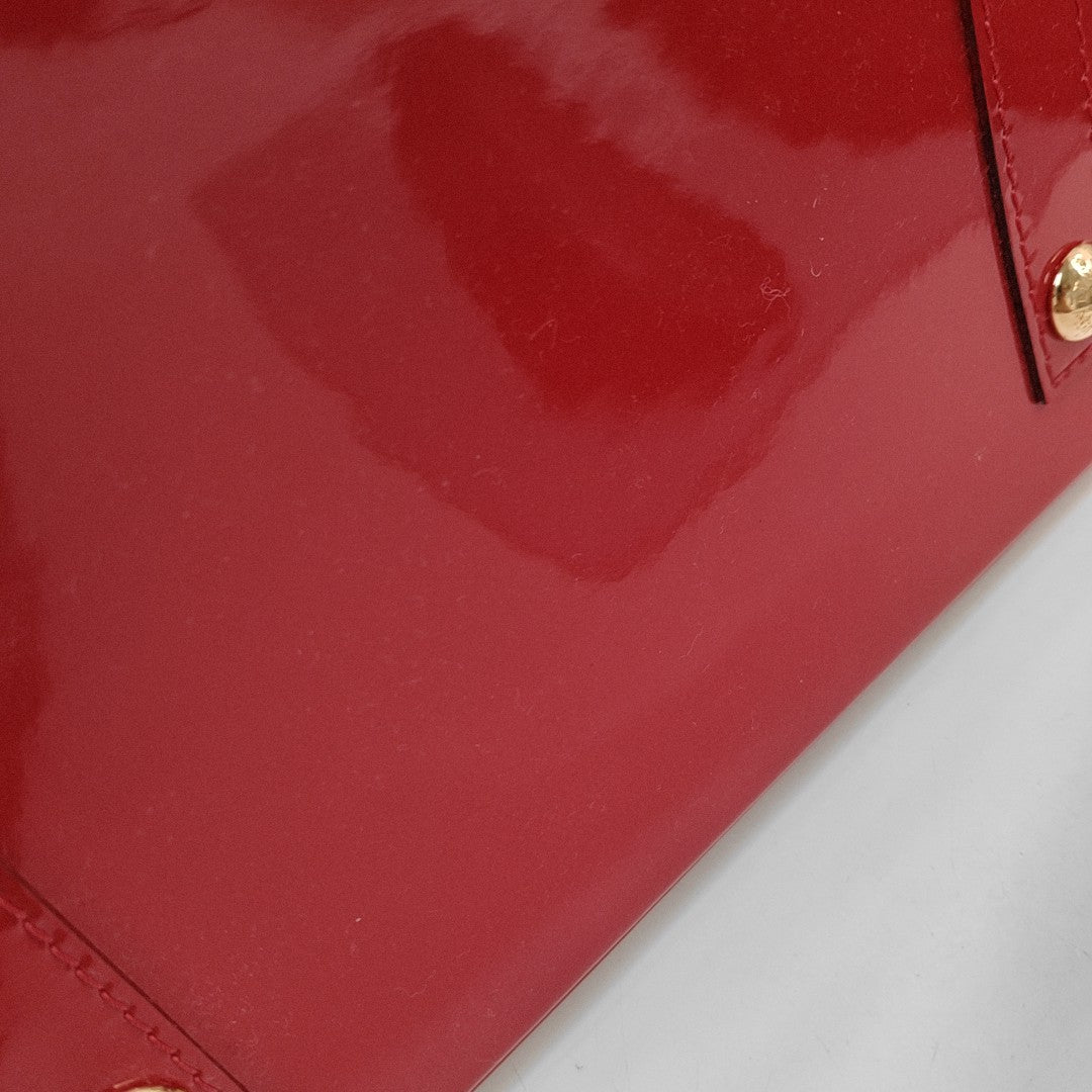 Authenticated pre-owned  Alma PM Monogram Patent Leather Red - Top Handle Bag at Looply
